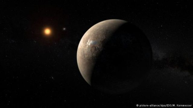 Ilustração mostra o planeta Proxima b orbitando ao redor da anã vermelha Proxima Centauri, vizinha mais próxima do Sol (Foto: ESO/M. Kornmesser)